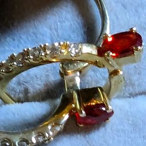 Red gemstone yellow gold over sterling post earrings